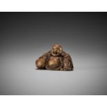 A FINE WOOD NETSUKE OF HOTEI