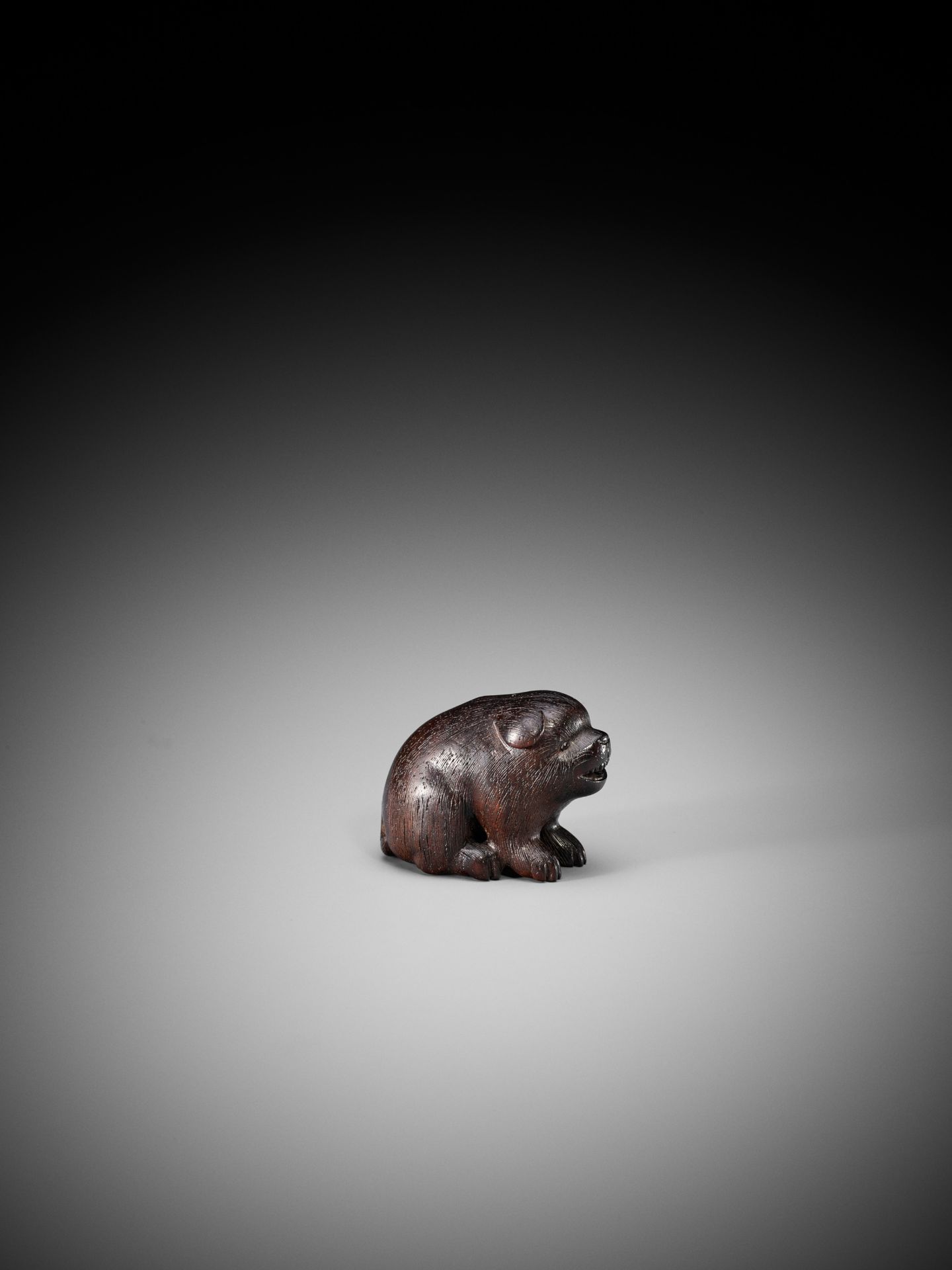 RANICHI: A DARK WOOD NETSUKE OF A PUPPY - Bild 8 aus 9