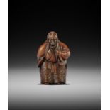 A POWERFUL WOOD NETSUKE OF KIYOHIME