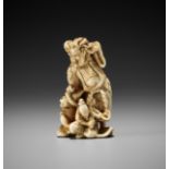 A RARE AND UNUSUAL IVORY NETSUKE OF A SENNIN AND TWO ATTENDANTS