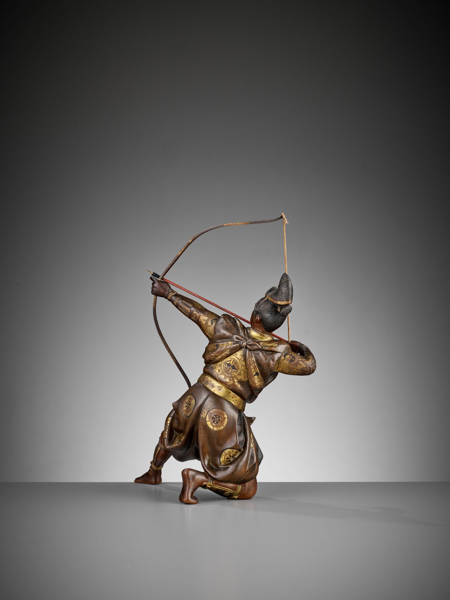 KOICHI: A PARCEL GILT BRONZE FIGURE OF AN ARCHER - Image 3 of 11