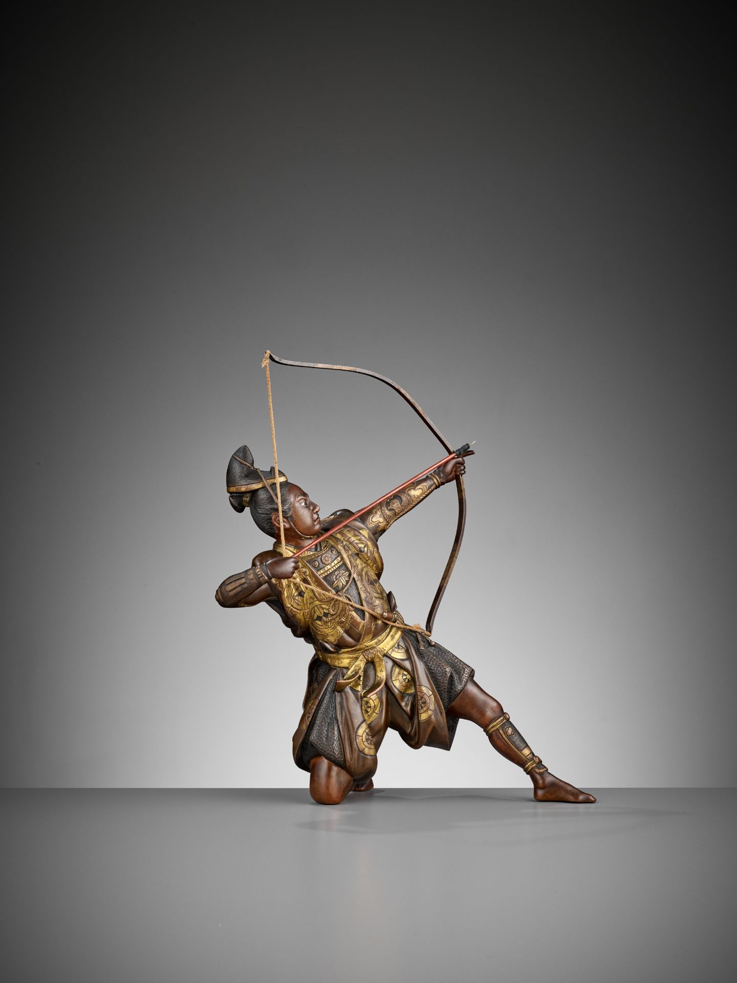 KOICHI: A PARCEL GILT BRONZE FIGURE OF AN ARCHER - Image 7 of 11