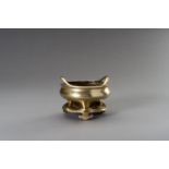 A GILT-BRONZE TRIPOD CENSER WITH MATCHING STAND