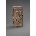 A TERRACOTTA WALL BRICK DEPICTING A CHILD WITH UMBRELLA, SONG DYNASTY