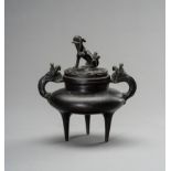 A MINIATURE BRONZE 'BUDDHIST LION' TRIPOD CENSER, QING DYNASTY