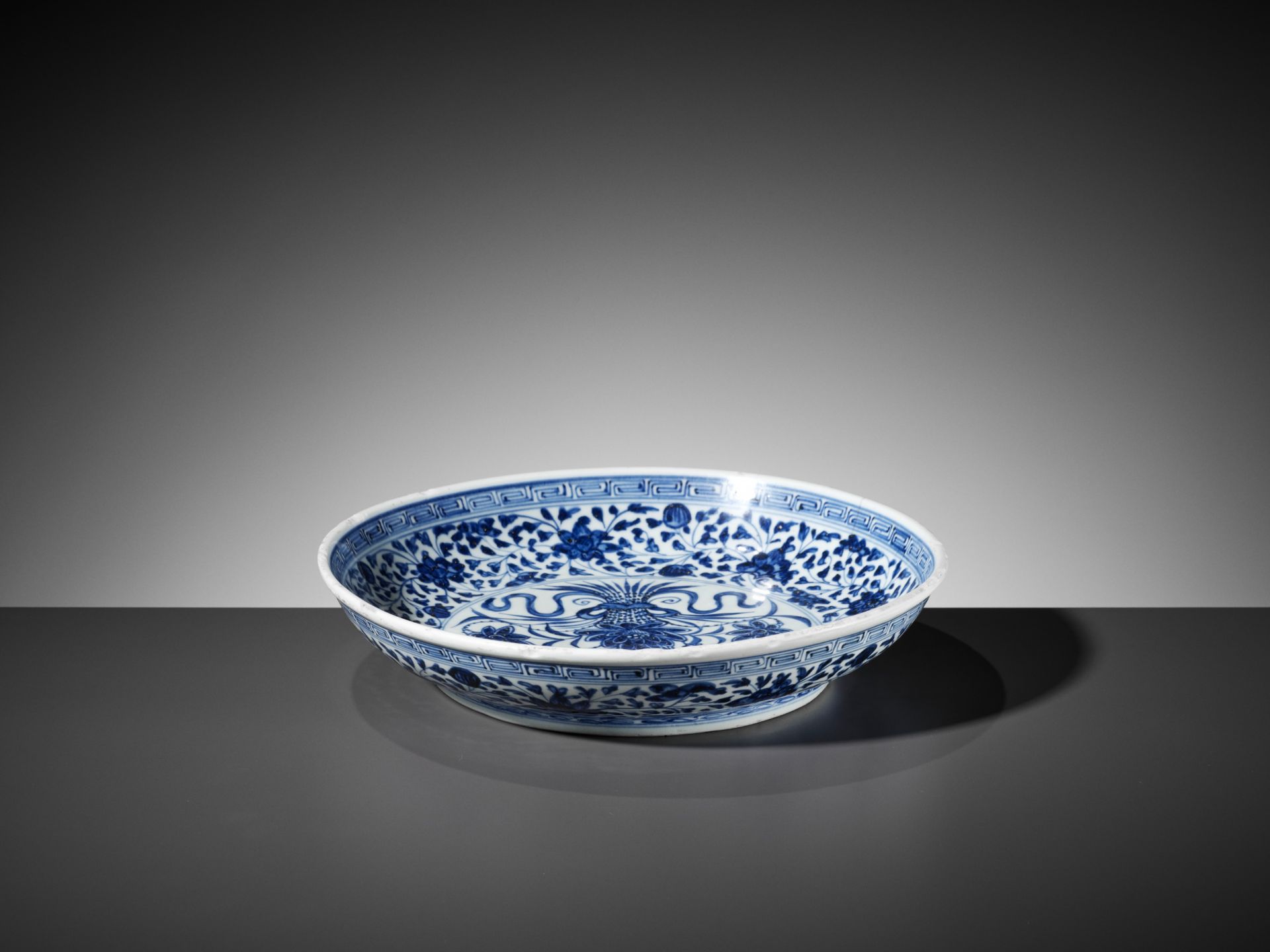 A MING-STYLE BLUE AND WHITE 'LOTUS BOUQUET' DISH, 18TH CENTURY - Image 6 of 8