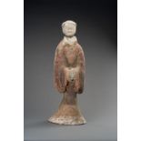 A LARGE PAINTED POTTERY FIGURE OF A COURT-LADY, HAN DYNASTY