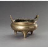 A LARGE GILT BRONZE TRIPOD CENSER