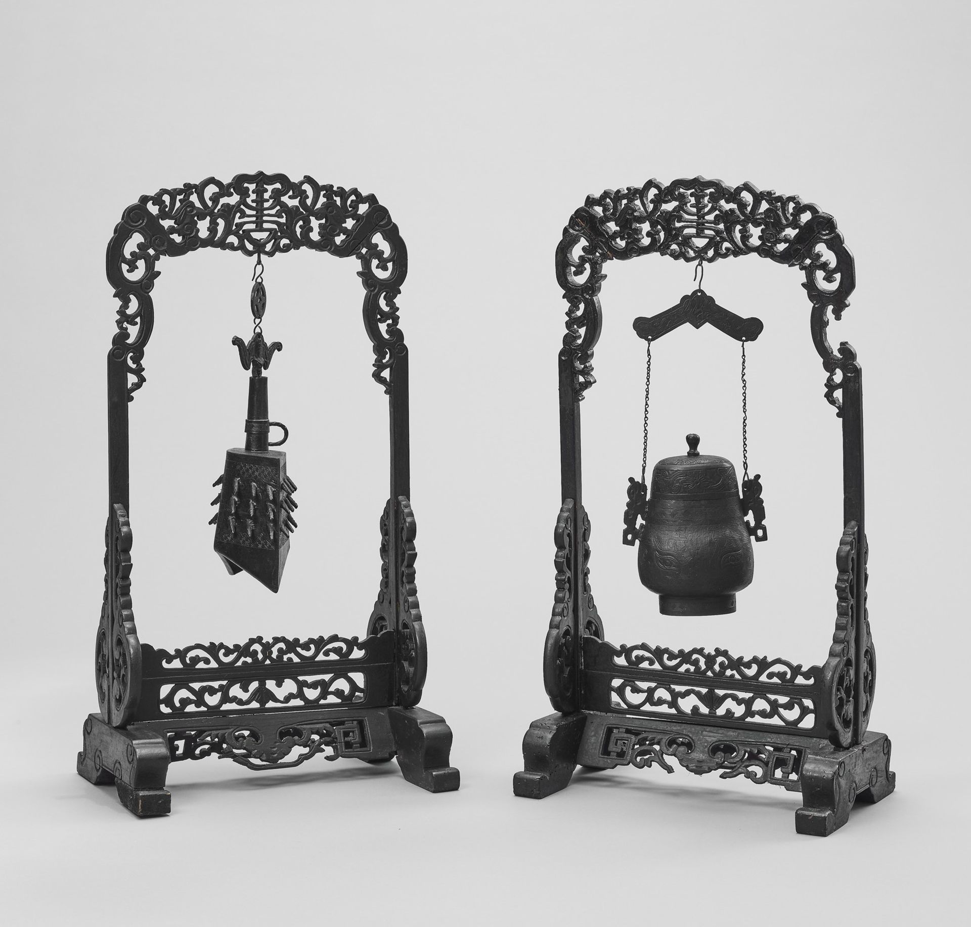 AN ARCHAISTIC BRONZE TEMPLE BELL AND VESSEL SUSPENDED IN HARDWOOD FRAMES AND STANDS, QING