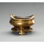 A LARGE GILT BRONZE TRIPOD CENSER WITH MATCHING STAND