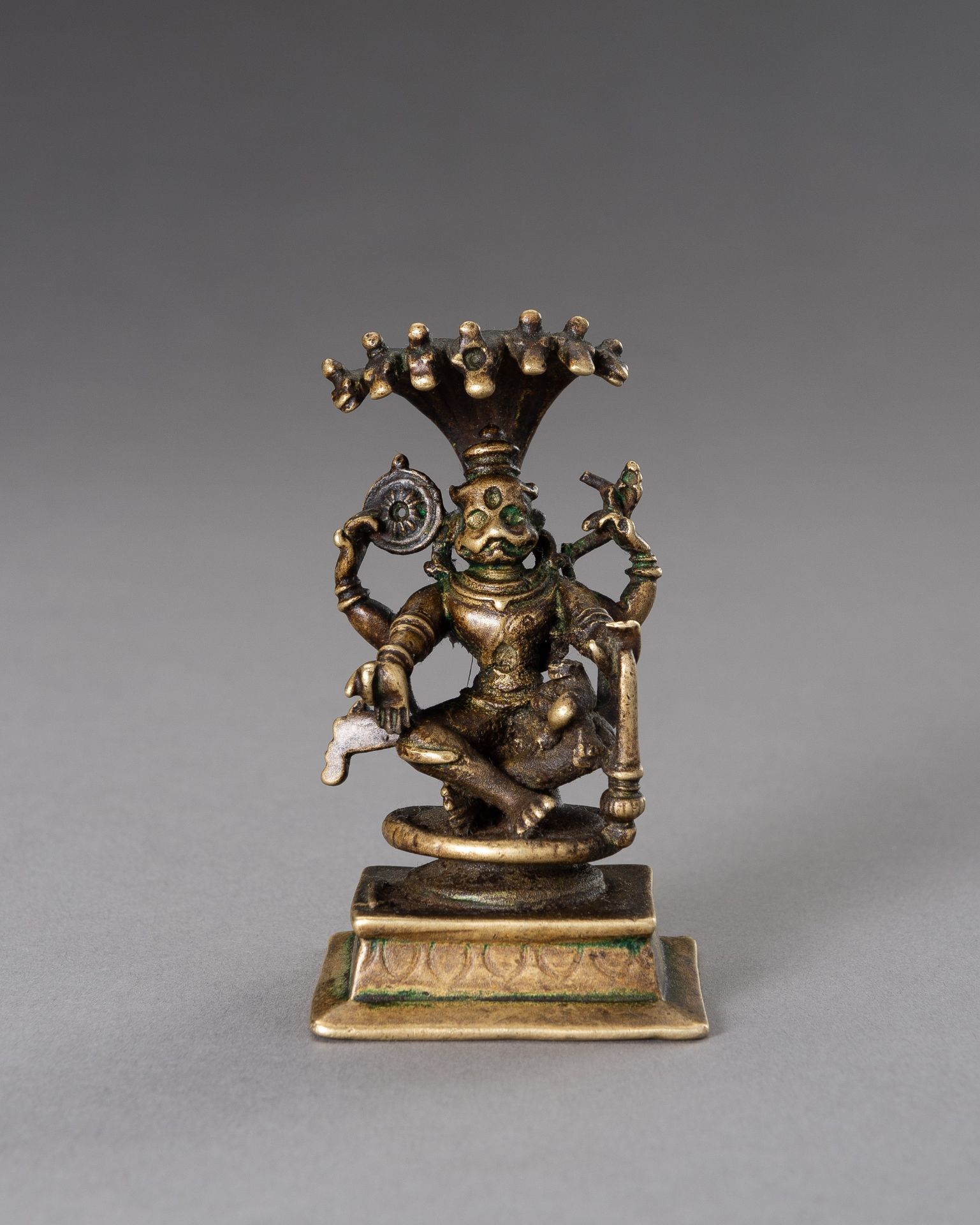 A BRONZE FIGURE OF LAKSHMI NARASIMHA