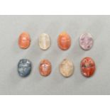 A GROUP OF EIGHT SCARAB HARDSTONE PENDANTS