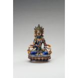 AN ENAMELLED BRONZE FIGURE OF VAJRASATTVATMIKA