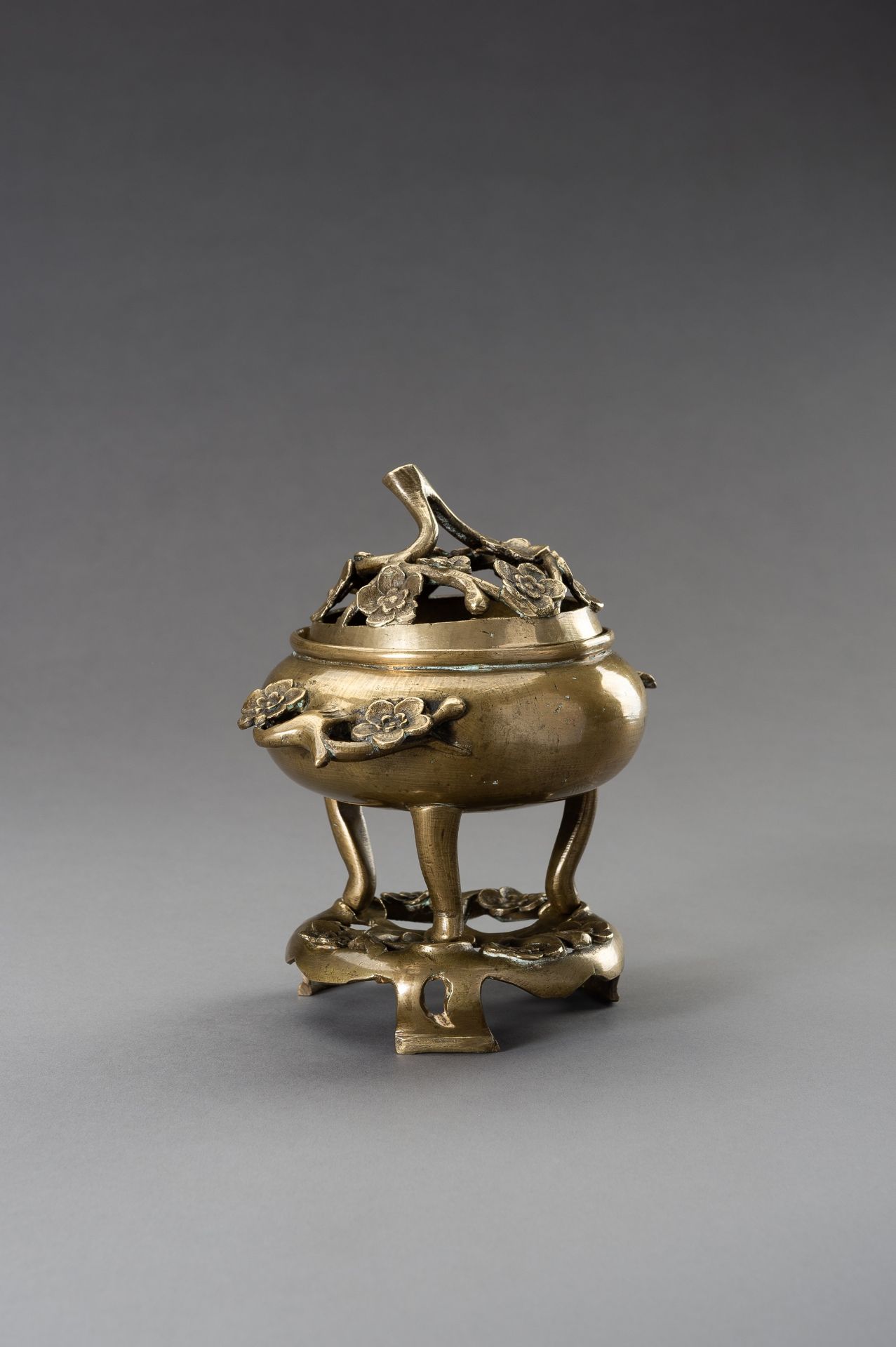 A 'CHERRY BLOSSOMS' BRONZE TRIPOD CENSER WITH MATCHING STAND, QING DYNASTY - Image 2 of 12