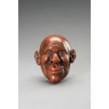 A LACQUERED WOOD MASK OF A SMILING MAN, MEIJI PERIOD