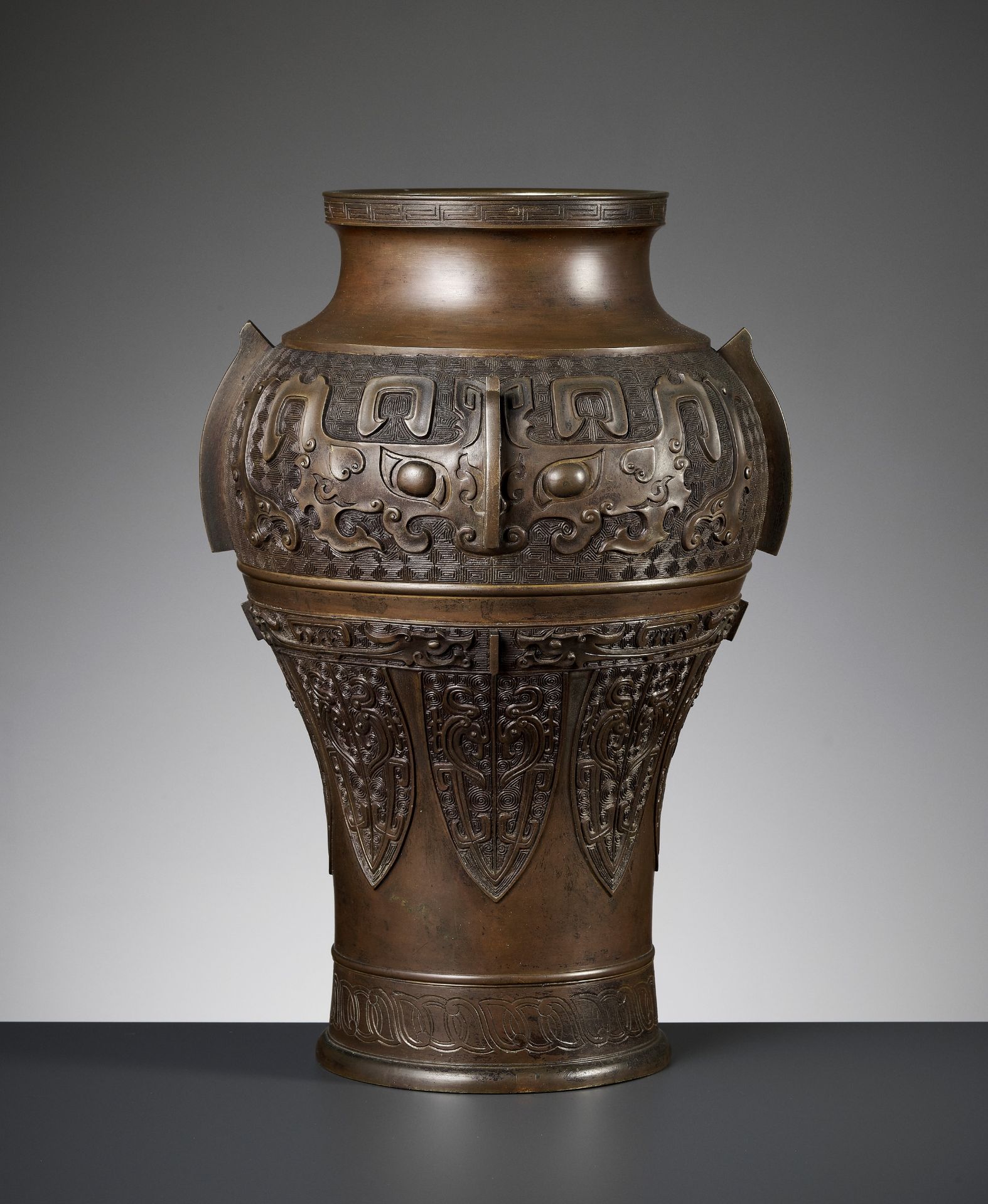 A MASSIVE BRONZE 'ARCHAISTIC' BALUSTER VASE, LATE MING TO EARLY QING