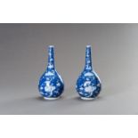 A PAIR OF BLUE AND WHITE 'PRUNUS AND CRACKED ICE' BOTTLE VASES, REPUBLIC PERIOD