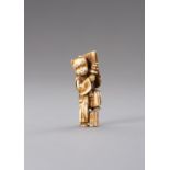 AN IVORY NETSUKE OF A KYOGEN ACTOR WITH FOX MASK