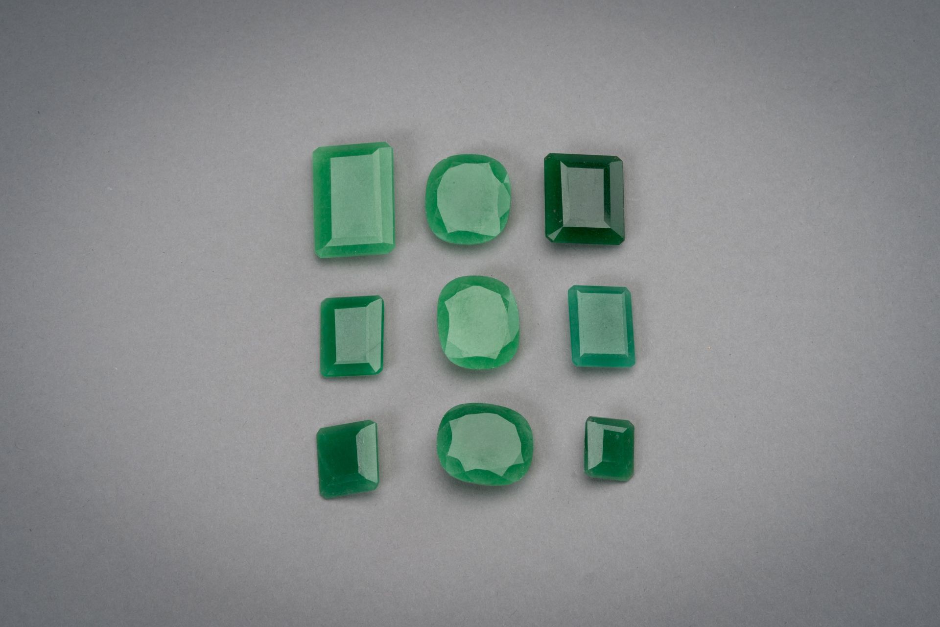 A COLLECTION OF NINE EMERALDS