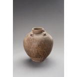 A CHESTNUT GLAZED MARTABAN CERAMIC STORAGE JAR