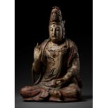 A POLYCHROME-PAINTED WOOD FIGURE OF GUANYIN, MING DYNASTY