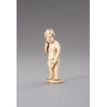 GYOKUZAN: AN IVORY NETSUKE OF A NUDE WOMAN WITH FAN