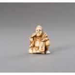 TOMOTSUGU: AN IVORY NETSUKE OF A SMOKING MAN