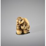 YOSHIMASA: A RARE IVORY NETSUKE OF A DRUNKARD