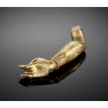 A GILT BRONZE 'KARANA MUDRA' FRAGMENTARY ARM, MING DYNASTY