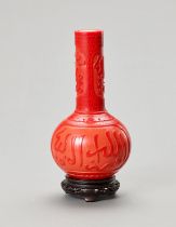 A RED PEKING GLASS BOTTLE VASE FOR THE ISLAMIC MARKET