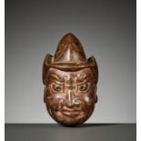 A LARGE AND RARE PAINTED GIGAKU WOOD MASK NETSUKE OF SUIKO-O