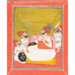AN INDIAN MINIATURE PAINTING OF A NOBLEMAN WITH ATTENDANTS