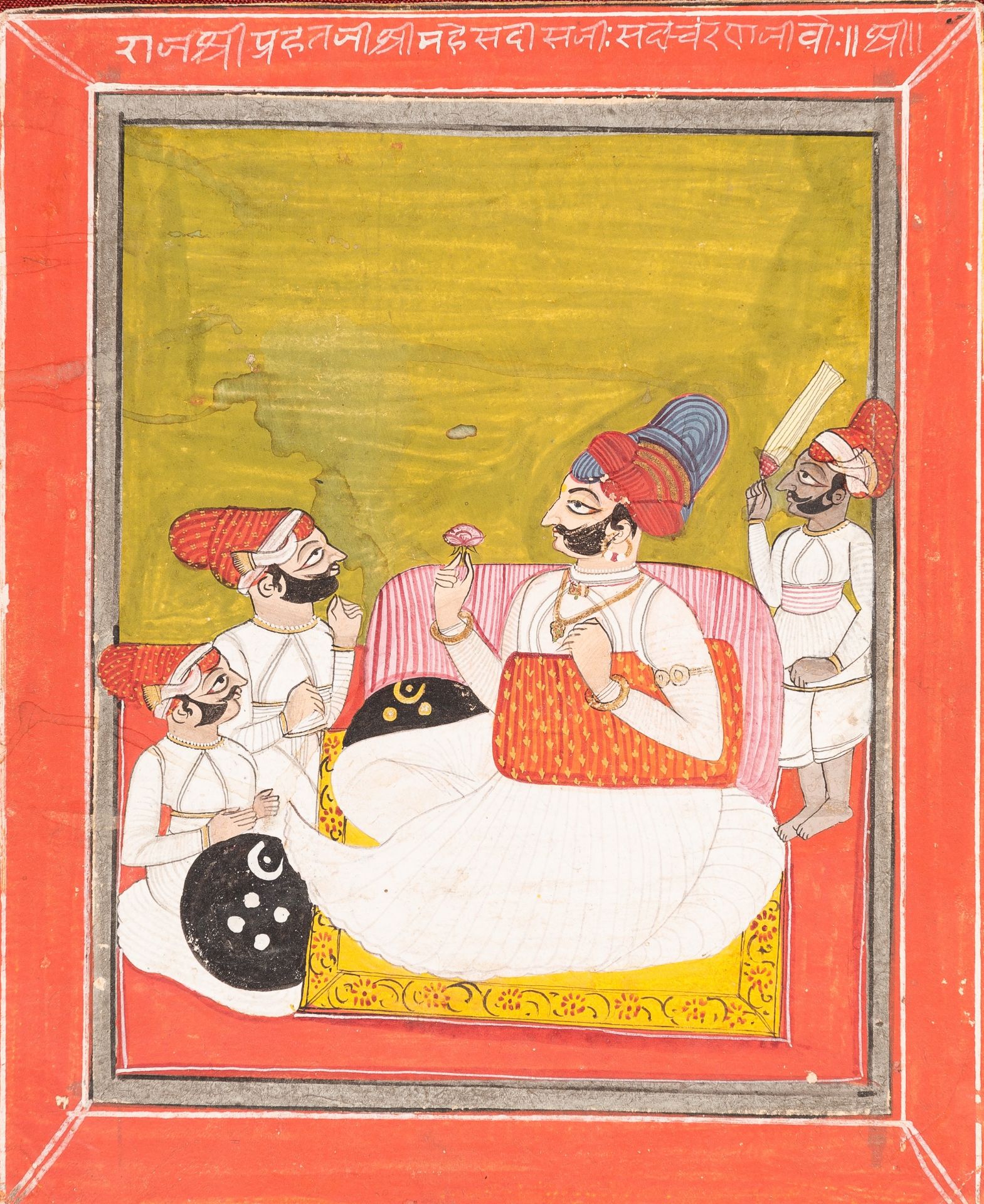 AN INDIAN MINIATURE PAINTING OF A NOBLEMAN WITH ATTENDANTS