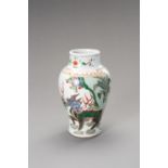 A FAMILLE VERTE 'QILIN' BALUSTER VASE, LATE QING TO REPUBLIC