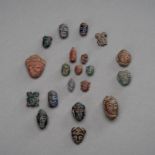 A GROUP OF 20 SMALL BACTRIAN HEADS