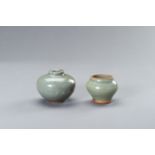 TWO SMALL CELADON GLAZED JARS