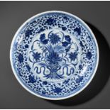 A MING-STYLE BLUE AND WHITE 'LOTUS BOUQUET' DISH, 18TH CENTURY