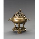 A 'CHERRY BLOSSOMS' BRONZE TRIPOD CENSER WITH MATCHING STAND, QING DYNASTY