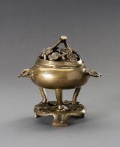 A 'CHERRY BLOSSOMS' BRONZE TRIPOD CENSER WITH MATCHING STAND, QING DYNASTY