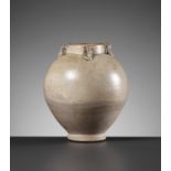 A CELADON-GLAZED JAR, SUI TO TANG DYNASTY