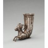 A WESTERN ASIATIC SILVER REPOUSSE RHYTON