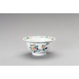 A FAMILLE VERTE 'AUSPICIOUS FLOWERS' BOWL, LATE QING DYNATY
