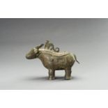 AN ARCHAISTIC SHANG-STYLE BRONZE RITUAL WINE VESSEL IN THE FORM OF A BUFFALO