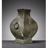 A BRONZE STORAGE VESSEL, FANGHU, HAN DYNASTY