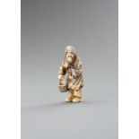 A SMALL IVORY NETSUKE OF TOBOSAKU SENNIN