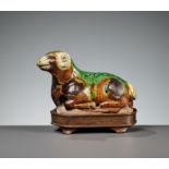 A RARE SANCAI-GLAZED POTTERY FIGURE OF A RAM, TANG DYNASTY