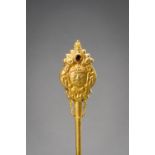 A CHAM GEMSTONE SET GOLD HAIRPIN WITH THE HEAD OF SHIVA