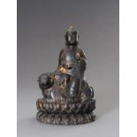 A BRONZE FIGURE OF MANJUSHRI SEATED ON A LION, 20TH CENTURY