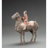 A PAINTED POTTERY HORSE AND RIDER, HAN DYNASTY