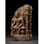 A RED SANDSTONE RELIEF OF SHIVA, 12TH - 13TH CENTURY